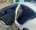 Белый Опель Инсигния, объемом двигателя 2 л и пробегом 209 тыс. км за 7800 $, фото 1 на Automoto.ua