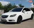 Білий Опель Інсігнія, об'ємом двигуна 1.96 л та пробігом 250 тис. км за 5999 $, фото 1 на Automoto.ua