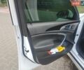 Білий Опель Інсігнія, об'ємом двигуна 1.96 л та пробігом 160 тис. км за 10000 $, фото 9 на Automoto.ua