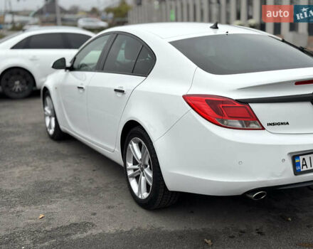 Білий Опель Інсігнія, об'ємом двигуна 2 л та пробігом 204 тис. км за 9500 $, фото 3 на Automoto.ua