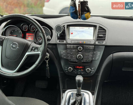 Білий Опель Інсігнія, об'ємом двигуна 2 л та пробігом 204 тис. км за 9500 $, фото 9 на Automoto.ua