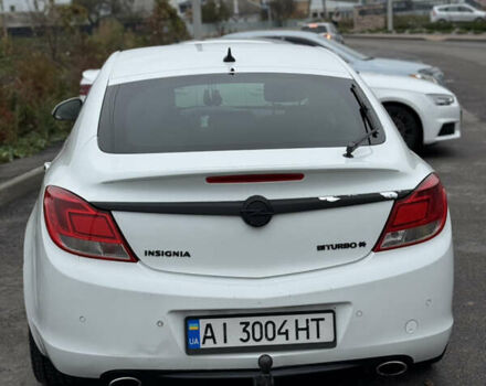 Білий Опель Інсігнія, об'ємом двигуна 2 л та пробігом 204 тис. км за 9500 $, фото 4 на Automoto.ua