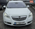 Білий Опель Інсігнія, об'ємом двигуна 2 л та пробігом 204 тис. км за 9500 $, фото 1 на Automoto.ua