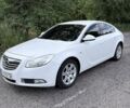 Белый Опель Инсигния, объемом двигателя 2 л и пробегом 296 тыс. км за 7037 $, фото 1 на Automoto.ua