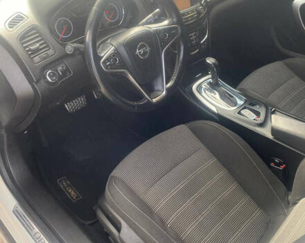 Белый Опель Инсигния, объемом двигателя 2 л и пробегом 285 тыс. км за 9900 $, фото 11 на Automoto.ua