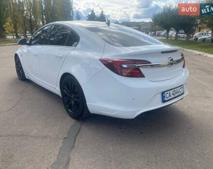 Белый Опель Инсигния, объемом двигателя 2 л и пробегом 285 тыс. км за 9900 $, фото 4 на Automoto.ua