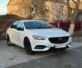 Белый Опель Инсигния, объемом двигателя 2 л и пробегом 196 тыс. км за 16500 $, фото 1 на Automoto.ua