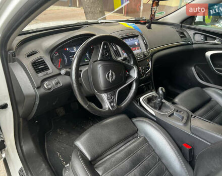 Білий Опель Інсігнія, об'ємом двигуна 1.6 л та пробігом 220 тис. км за 13000 $, фото 7 на Automoto.ua