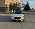 Білий Опель Інсігнія, об'ємом двигуна 1.96 л та пробігом 210 тис. км за 17500 $, фото 1 на Automoto.ua