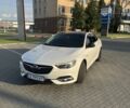 Білий Опель Інсігнія, об'ємом двигуна 2 л та пробігом 210 тис. км за 17021 $, фото 1 на Automoto.ua