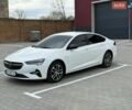 Білий Опель Інсігнія, об'ємом двигуна 1.5 л та пробігом 130 тис. км за 16700 $, фото 1 на Automoto.ua