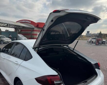 Білий Опель Інсігнія, об'ємом двигуна 1.5 л та пробігом 125 тис. км за 16700 $, фото 9 на Automoto.ua