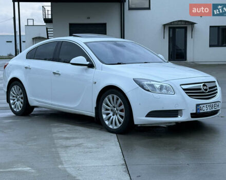 Білий Опель Інсігнія, об'ємом двигуна 2 л та пробігом 274 тис. км за 7400 $, фото 1 на Automoto.ua
