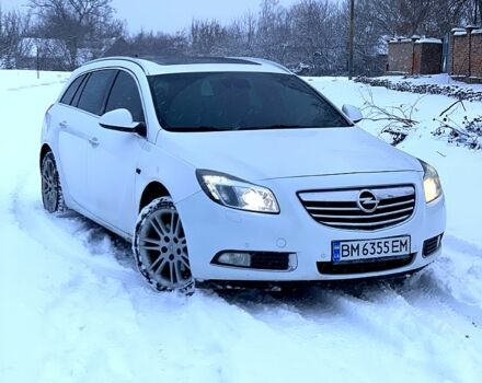 Белый Опель Инсигния, объемом двигателя 2 л и пробегом 23400 тыс. км за 6800 $, фото 1 на Automoto.ua