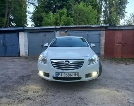 Білий Опель Інсігнія, об'ємом двигуна 2 л та пробігом 240 тис. км за 8600 $, фото 1 на Automoto.ua