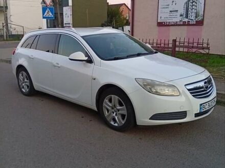 Білий Опель Інсігнія, об'ємом двигуна 1.96 л та пробігом 240 тис. км за 6900 $, фото 1 на Automoto.ua