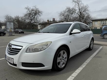 Білий Опель Інсігнія, об'ємом двигуна 2 л та пробігом 318 тис. км за 6999 $, фото 1 на Automoto.ua