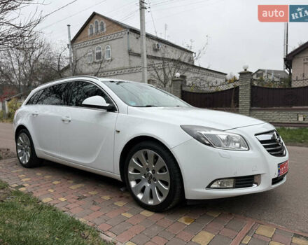 Білий Опель Інсігнія, об'ємом двигуна 1.6 л та пробігом 210 тис. км за 8300 $, фото 1 на Automoto.ua