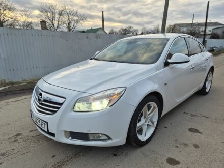 Білий Опель Інсігнія, об'ємом двигуна 2 л та пробігом 145 тис. км за 8950 $, фото 1 на Automoto.ua