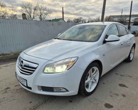 Білий Опель Інсігнія, об'ємом двигуна 2 л та пробігом 145 тис. км за 8950 $, фото 1 на Automoto.ua