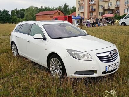 Білий Опель Інсігнія, об'ємом двигуна 2 л та пробігом 245 тис. км за 6800 $, фото 1 на Automoto.ua