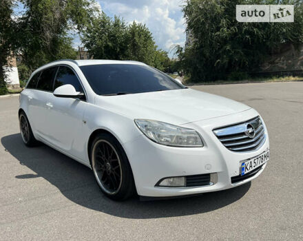 Білий Опель Інсігнія, об'ємом двигуна 1.96 л та пробігом 235 тис. км за 8700 $, фото 1 на Automoto.ua