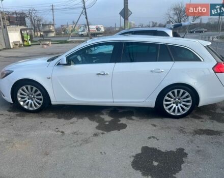 Білий Опель Інсігнія, об'ємом двигуна 1.96 л та пробігом 290 тис. км за 7999 $, фото 1 на Automoto.ua