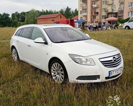 Білий Опель Інсігнія, об'ємом двигуна 2 л та пробігом 245 тис. км за 7300 $, фото 1 на Automoto.ua