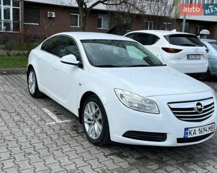 Белый Опель Инсигния, объемом двигателя 2 л и пробегом 178 тыс. км за 6800 $, фото 1 на Automoto.ua