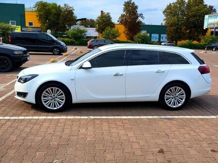 Білий Опель Інсігнія, об'ємом двигуна 2 л та пробігом 201 тис. км за 12450 $, фото 1 на Automoto.ua