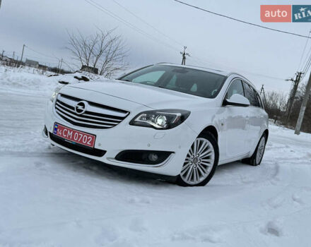 Белый Опель Инсигния, объемом двигателя 2 л и пробегом 248 тыс. км за 10650 $, фото 1 на Automoto.ua