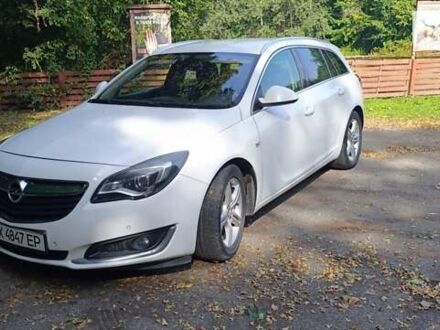 Белый Опель Инсигния, объемом двигателя 2 л и пробегом 237 тыс. км за 10700 $, фото 1 на Automoto.ua