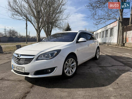Білий Опель Інсігнія, об'ємом двигуна 2 л та пробігом 221 тис. км за 11600 $, фото 1 на Automoto.ua