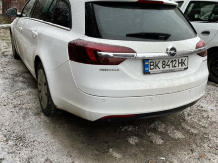 Білий Опель Інсігнія, об'ємом двигуна 2 л та пробігом 235 тис. км за 10500 $, фото 1 на Automoto.ua