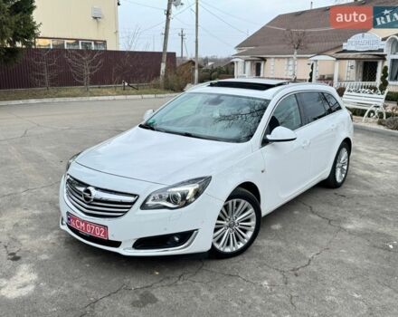 Белый Опель Инсигния, объемом двигателя 2 л и пробегом 248 тыс. км за 11200 $, фото 1 на Automoto.ua