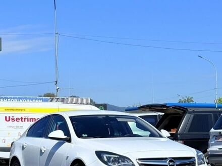 Білий Опель Інсігнія, об'ємом двигуна 1.6 л та пробігом 215 тис. км за 10999 $, фото 1 на Automoto.ua