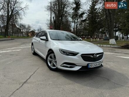 Білий Опель Інсігнія, об'ємом двигуна 1.6 л та пробігом 215 тис. км за 12800 $, фото 1 на Automoto.ua