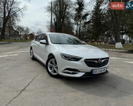 Білий Опель Інсігнія, об'ємом двигуна 1.6 л та пробігом 215 тис. км за 12800 $, фото 1 на Automoto.ua