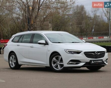 Белый Опель Инсигния, объемом двигателя 2 л и пробегом 240 тыс. км за 15900 $, фото 1 на Automoto.ua