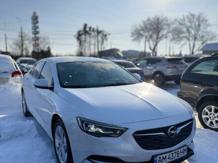 Білий Опель Інсігнія, об'ємом двигуна 1.96 л та пробігом 235 тис. км за 14999 $, фото 1 на Automoto.ua