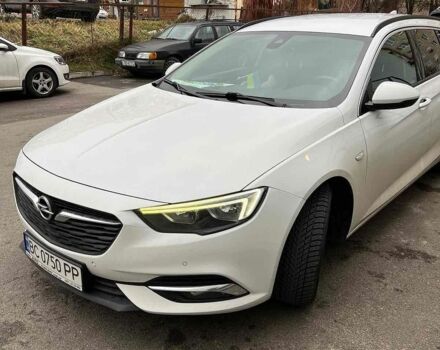 Білий Опель Інсігнія, об'ємом двигуна 2 л та пробігом 228 тис. км за 13400 $, фото 1 на Automoto.ua