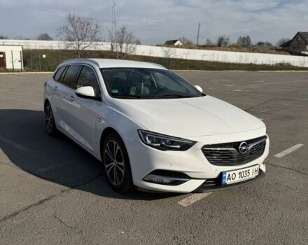 Белый Опель Инсигния, объемом двигателя 2 л и пробегом 240 тыс. км за 16500 $, фото 1 на Automoto.ua