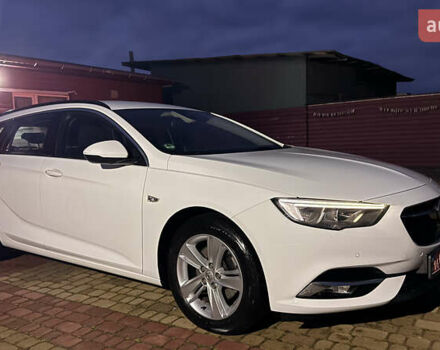 Білий Опель Інсігнія, об'ємом двигуна 1.96 л та пробігом 149 тис. км за 15500 $, фото 1 на Automoto.ua