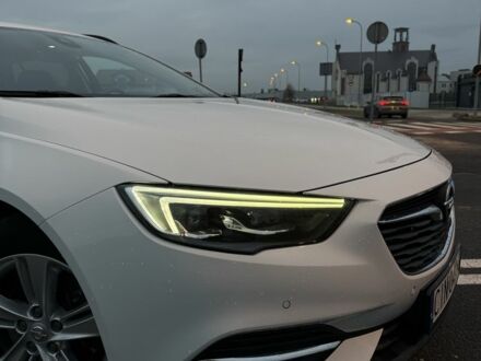 Білий Опель Інсігнія, об'ємом двигуна 2 л та пробігом 178 тис. км за 13000 $, фото 1 на Automoto.ua