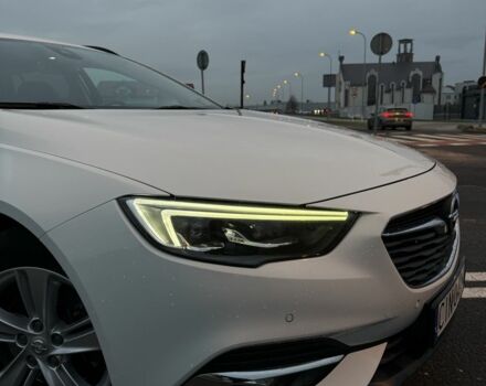 Білий Опель Інсігнія, об'ємом двигуна 2 л та пробігом 178 тис. км за 13000 $, фото 1 на Automoto.ua