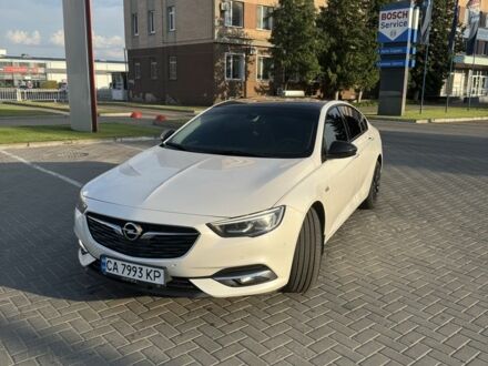 Білий Опель Інсігнія, об'ємом двигуна 2 л та пробігом 210 тис. км за 17021 $, фото 1 на Automoto.ua