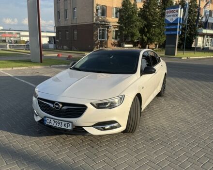 Білий Опель Інсігнія, об'ємом двигуна 2 л та пробігом 210 тис. км за 17021 $, фото 1 на Automoto.ua