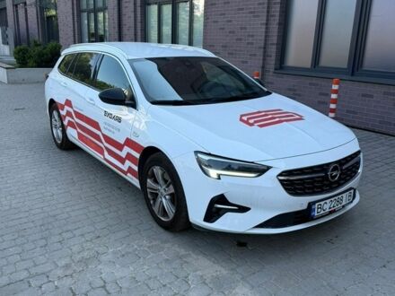 Белый Опель Инсигния, объемом двигателя 2 л и пробегом 150 тыс. км за 18500 $, фото 1 на Automoto.ua