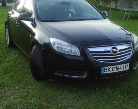Черный Опель Инсигния, объемом двигателя 2 л и пробегом 321 тыс. км за 7200 $, фото 1 на Automoto.ua