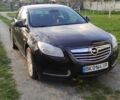 Черный Опель Инсигния, объемом двигателя 2 л и пробегом 318 тыс. км за 7550 $, фото 1 на Automoto.ua